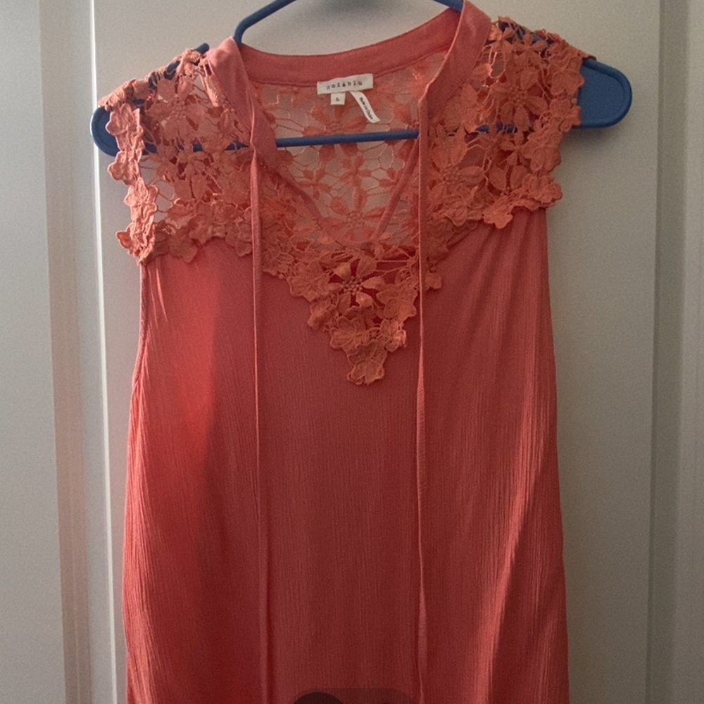Soié blu melon sleeveless blouse, size L.